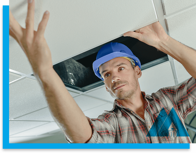 Man working in interior ceiling